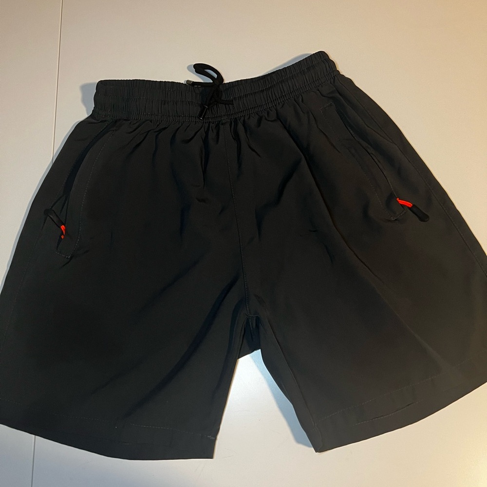 Boys 2 pair large black and grey casual shorts.